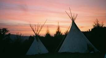 Teepees as sunset