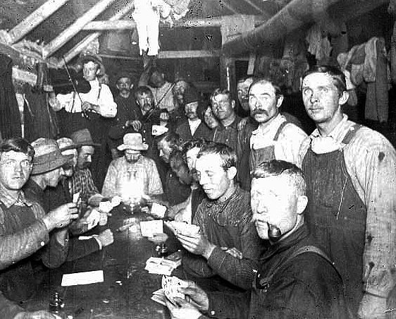 Miners playing cards in their camp, Coleraine, 1906.