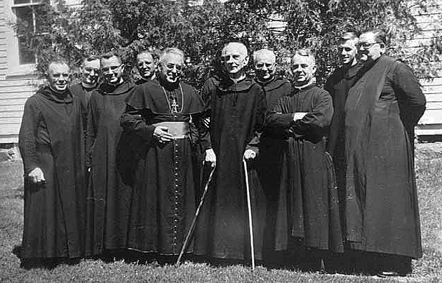 Bishop Francis J. Schenk being adopted into tribe, Red Lake, ca. 1954