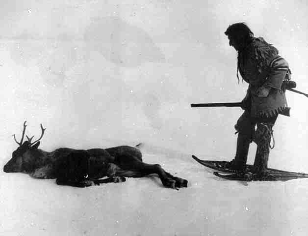 Indian hunter with deer.