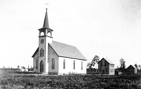 Roman Catholic Church and part of school, Red Lake, ca. 1910.