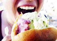 Sicilian ice-cream in a bread bun. A good solution to a local problem: the Mediterranean heat quickly melts the ice-cream, which is absorbed by the bread.