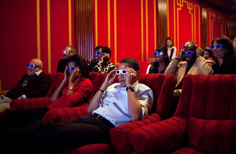 Barack and Michelle Obama, along with their party, watch the commercials during Super Bowl XLIII in the White House theatre using ColorCode 3D.