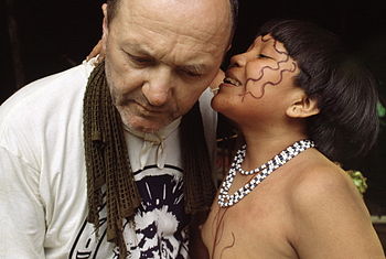 A Yanomamo woman wih visitor.
