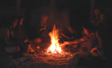 prehistoric tribe around fire