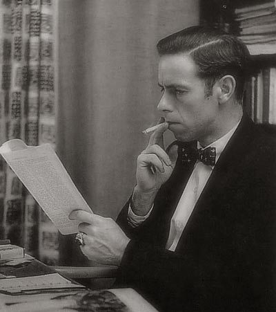 young alan watts reading paper
