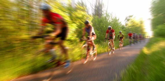 UMD Rec Sports Tri Team athletes train during an early morning ride on the Munger Trail.