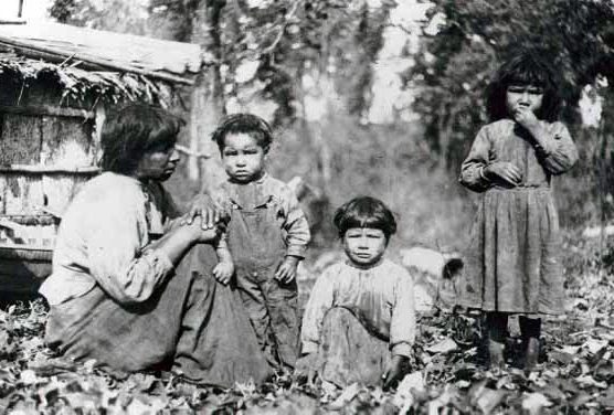 Billie Bedasky's wife Equay with their children, George, Selma (Misasowagside) and Rose (Gaybagbe), ca. 1911.