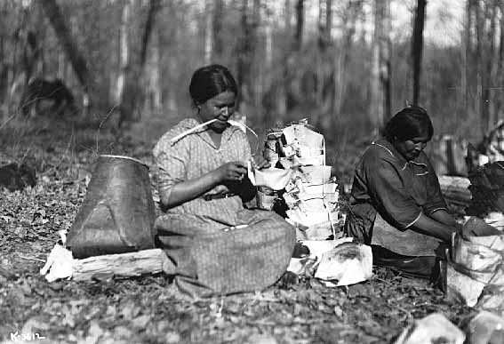 Mrs. Waboose (Wah Boose) and son, Jess,  making birch bark containers for sap, ca. 1930