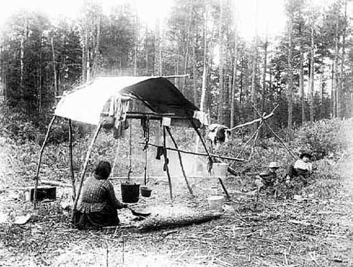 Cooking supper, Chippewa Indian camp, 1890