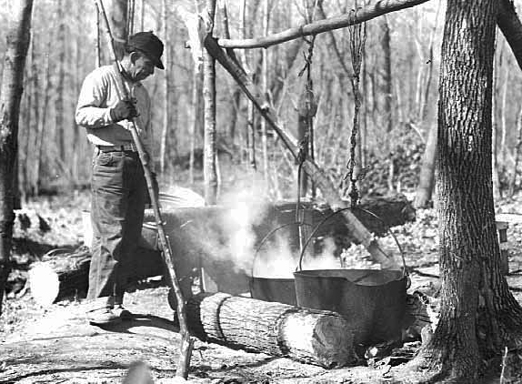 John Nickaboine boiling maple sap, ca. 1930.