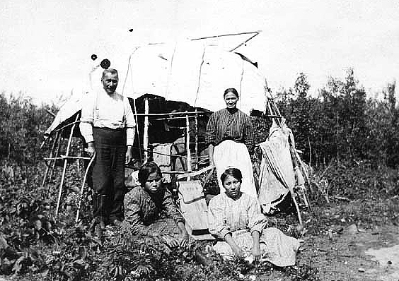 Reverend Louis Many Penny and family, Episcopal missionary at Leech Lake, 1909.