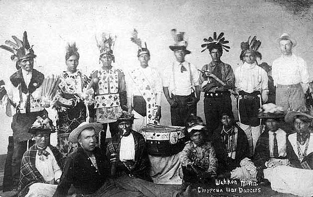Chippewa dancers in costume, Wahkon, Mille Lacs Reservation, ca. 1909.