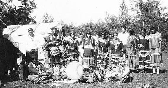 Chippewa Indians in ceremonial dress, Lake Mille Lacs, ca. 1930.