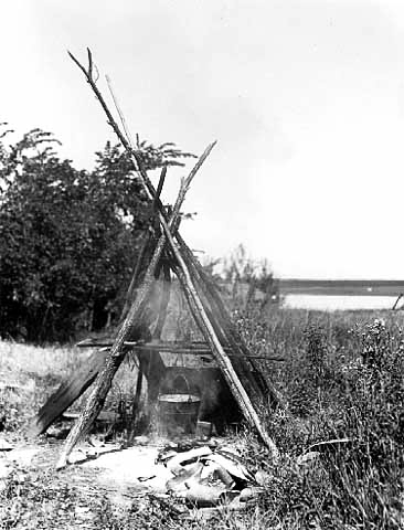 Cooking fire, Nett Lake, 1946.