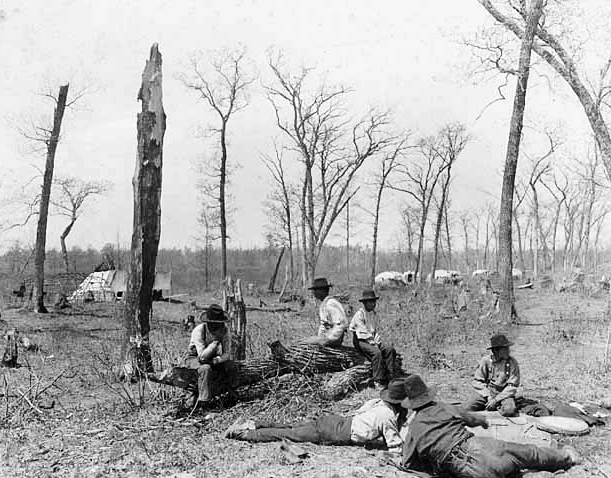 Chippewa Indians at Mille Lacs playing moccasin game, ca., 1885