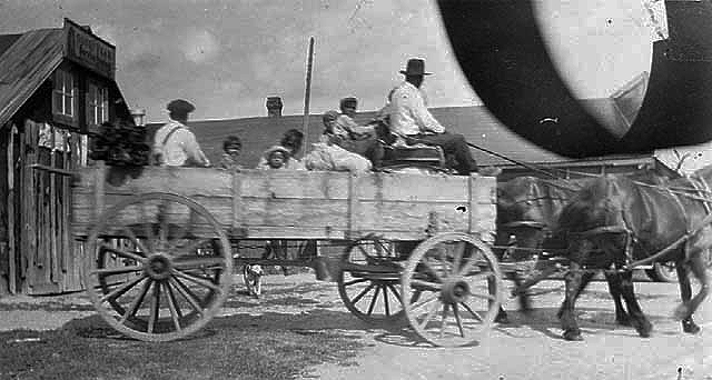 Indians in a horse drawn wagon, Nett Lake Indian Reservation, 1928.