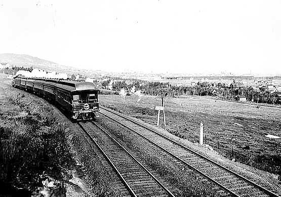 Duluth, Missabe and Northern Railway Company passenger train on the outskirts of Duluth, ca. 1910.