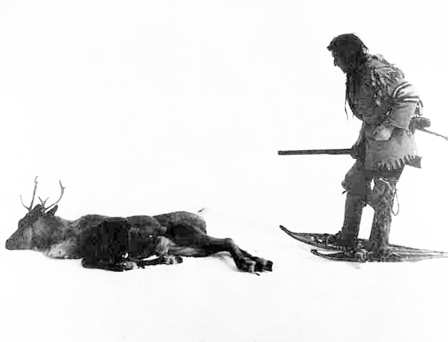 Indian hunter with deer.
