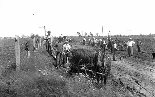 Road construction near Aitkin, ca. 1915.