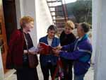 Vasiika residents looking at Friedl's book, January 2006.