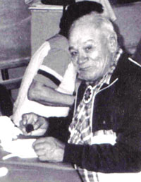 Jimmy Jackson sitting at a table.