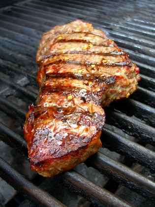 Steak on grill.