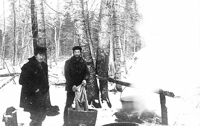 Washing clothes at Camp Number Five, near Deer River, ca. 1910.