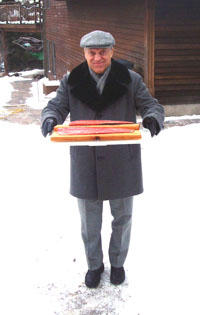 Joe Maiolo delivering salmon to the oven.