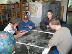 People studying radar images