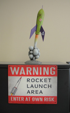 rocket with launch warning sign
